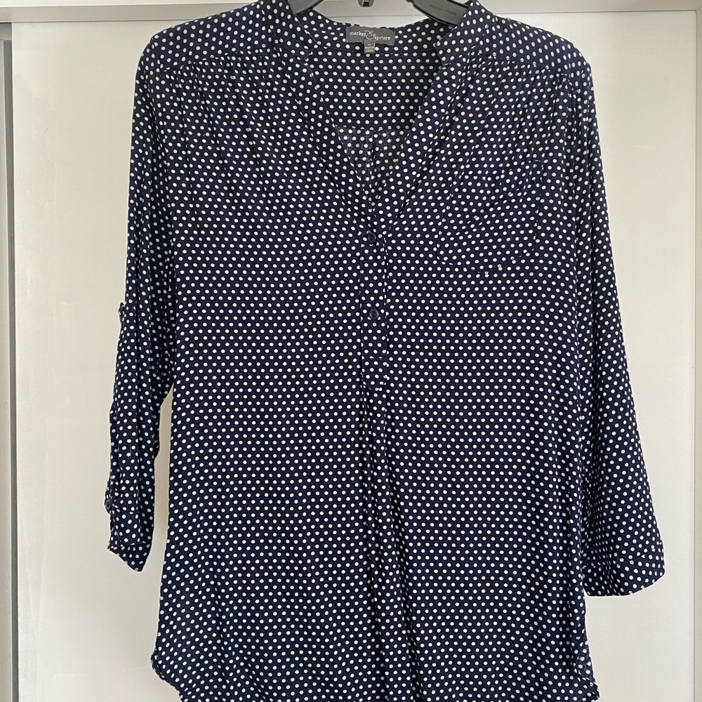 Navy and white polka dot blouse